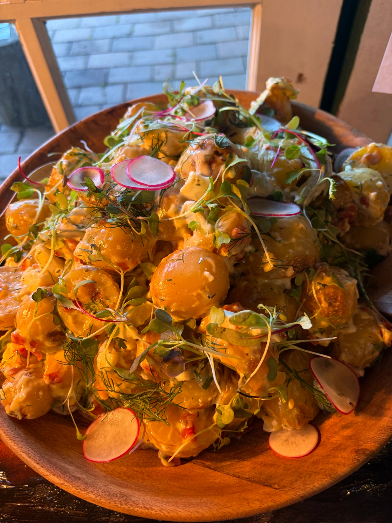 Kipfler potato salad with dill, radish and micro-herbs